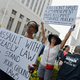 Protesters take part in a "Justice for Trayvon" vigil, organized by the National Action Network, outside Los Angeles courthouse on July 20, 2013. (Kevork Djansezian/Getty Images)